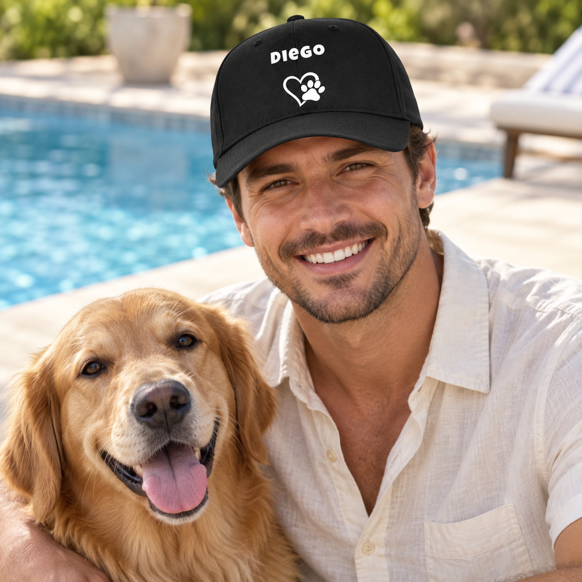 Personalized black cap with the name “Diego” and paw design, worn by a man next to a golden retriever.