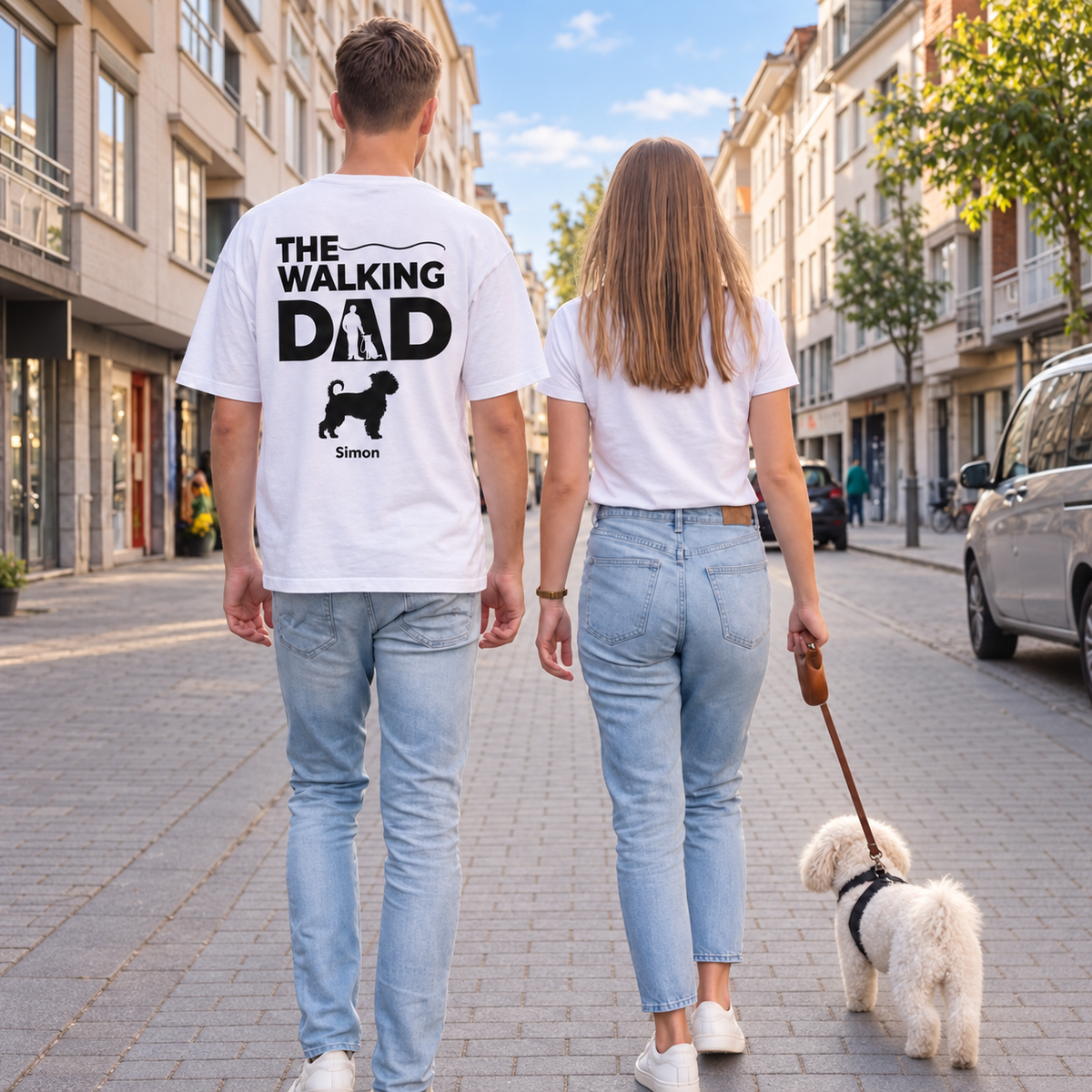 People seen from behind wearing personalized T-shirts. The grey T-shirt is printed with "The Walking Dad".