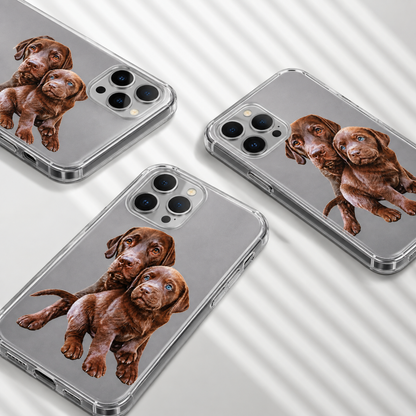 Three personalized phone cases with images of brown Labrador puppies. Clear material.