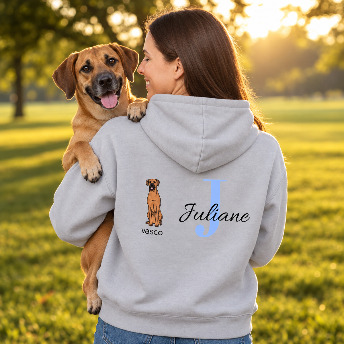 Grey hoodie with dog motif and initial "J", personalized for Juliane. Dog sitting on the wearer's shoulder.