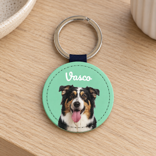 Personalized keychain with pet portrait in mint green design and silver ring.