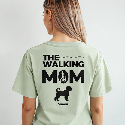 Personalized mint green T-shirt printed with "THE WALKING MOM" and dog silhouette.
