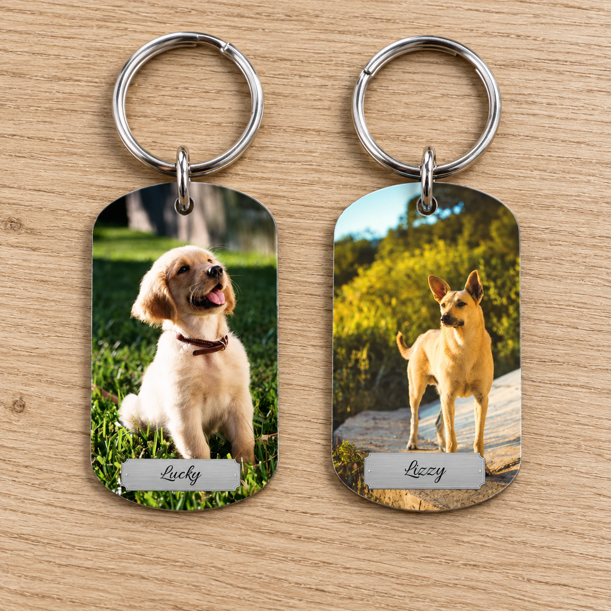 Double keychain with two dog photos and engraved names Lucky and Lizzy.
