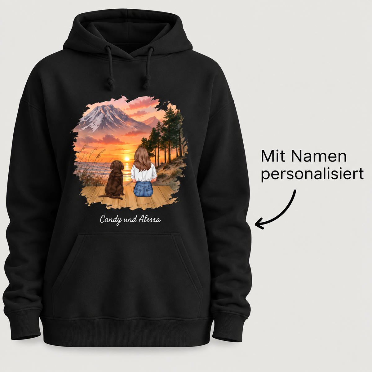 Black hoodie with personalized illustration of a person with a dog against a sunset.