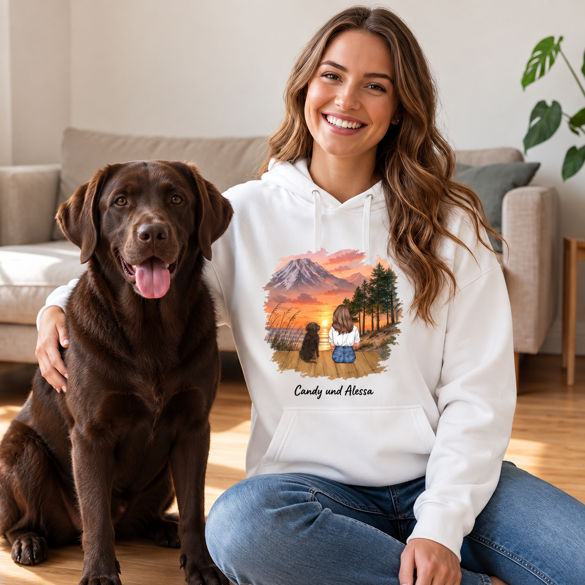 White hoodie with personalized print, showing a scene with a girl and a dog by the water.