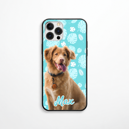 Personalized phone case with dog picture and turquoise leaf pattern. Name "Max" in white lettering.