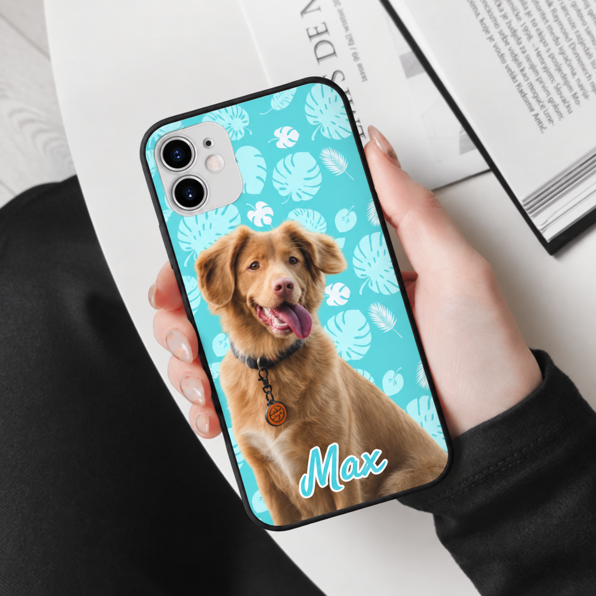 Personalized phone case with turquoise background and dog picture, name Max in light lettering.