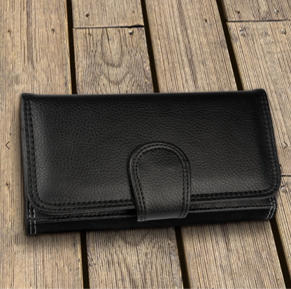 Black suede-look wallet, simple exterior with snap closure.