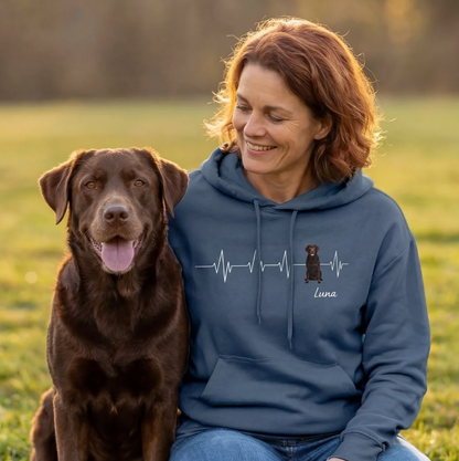 Personalized blue hoodie with heartbeat design and dog picture. Woman sitting with dog on the lawn.