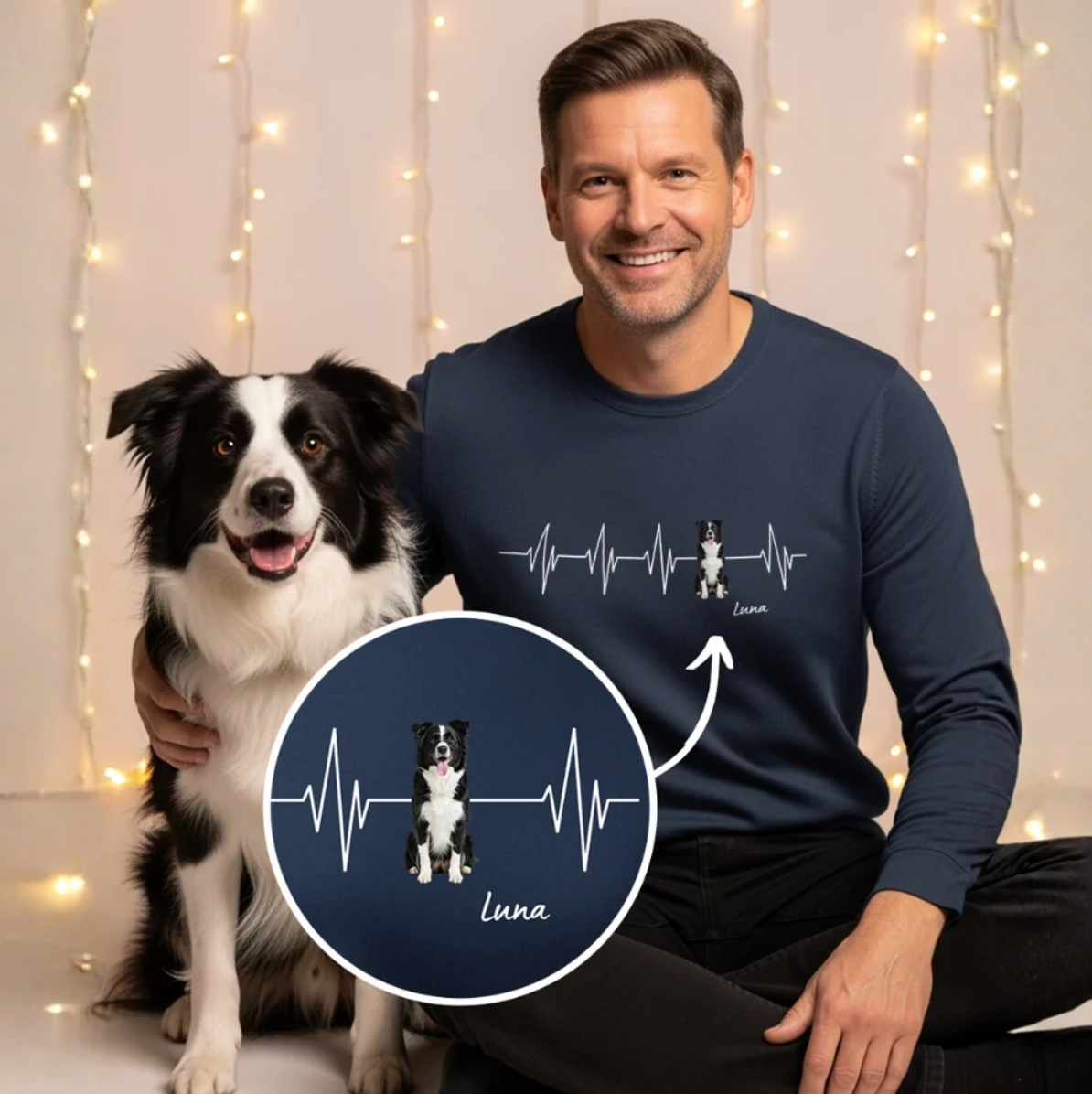 Dark blue sweatshirt with personalized heartbeat design and dog picture. Model sitting next to a dog.