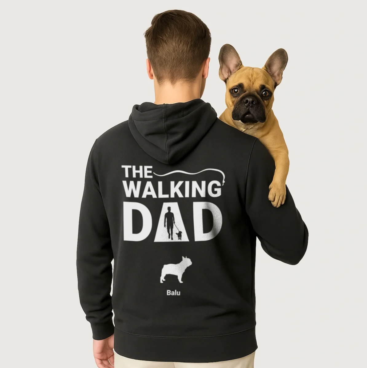 Black hoodie printed with "THE WALKING DAD" and a dog design on the back.