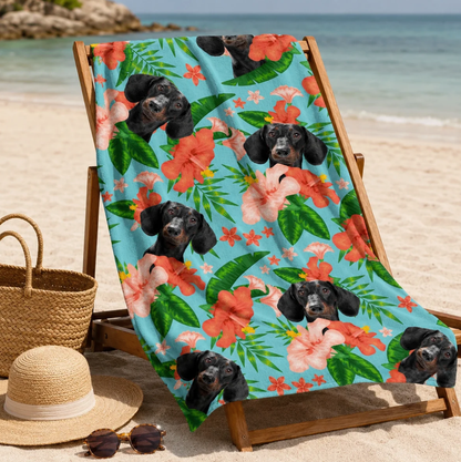 Personalized beach towel with colourful floral pattern and dog picture on a light blue background.