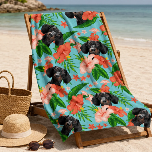 Personalized beach towel with colourful floral pattern and dog picture on a light blue background.