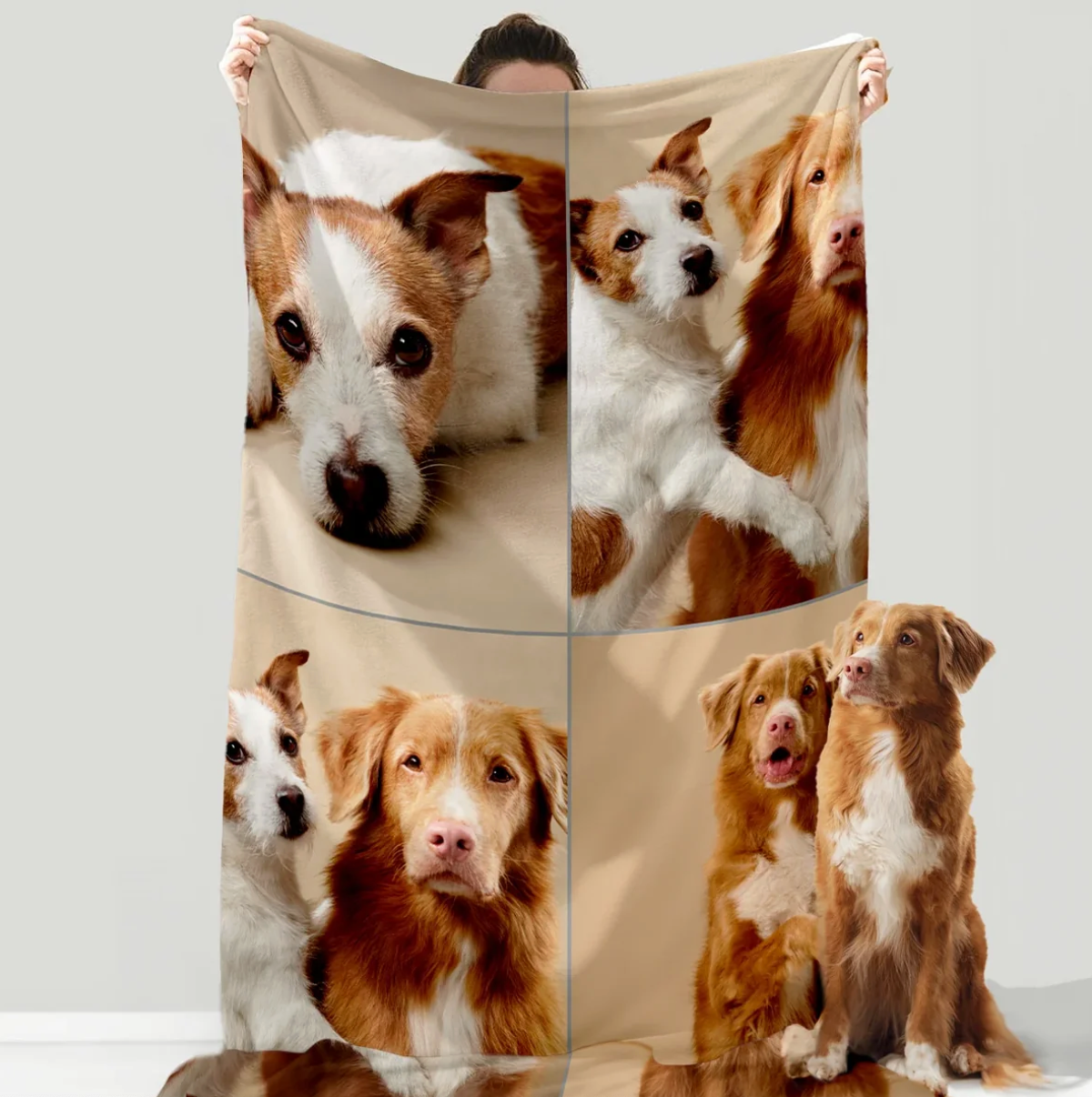 Personalized pet blanket with pictures of two dogs on a beige background.