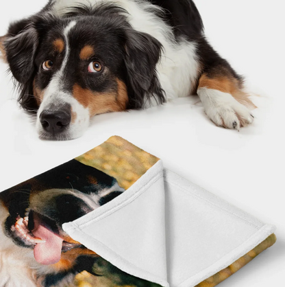 Personalized pet blanket with printed dog motif and soft white lining.