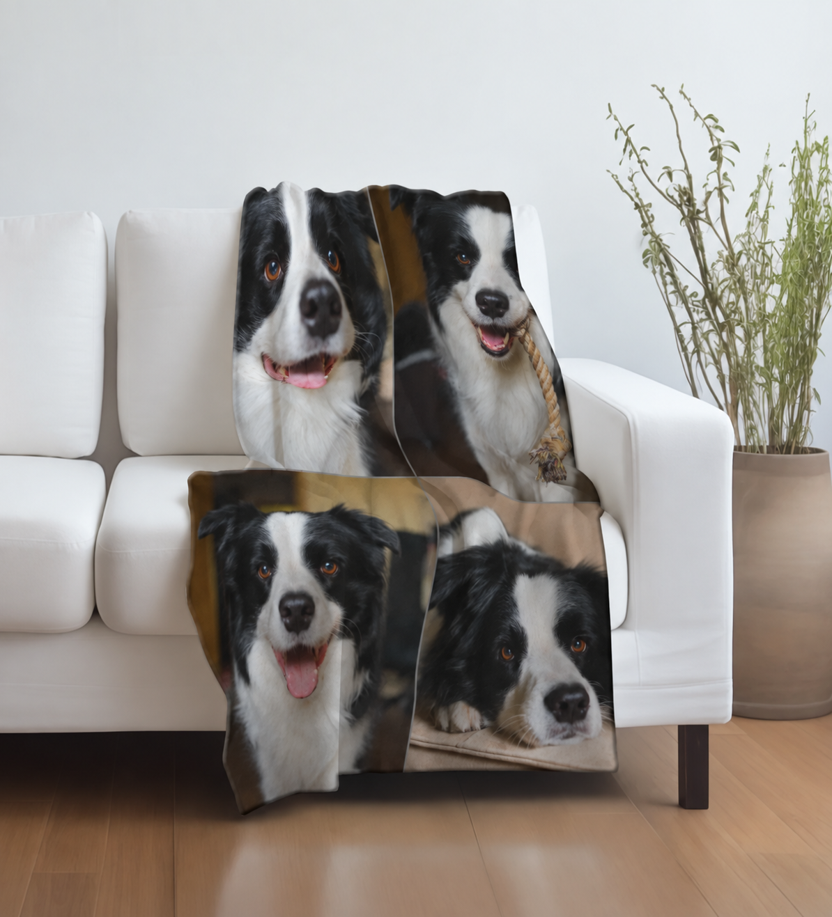 Personalized pet blanket with pictures of black-and-white dogs on a white couch.