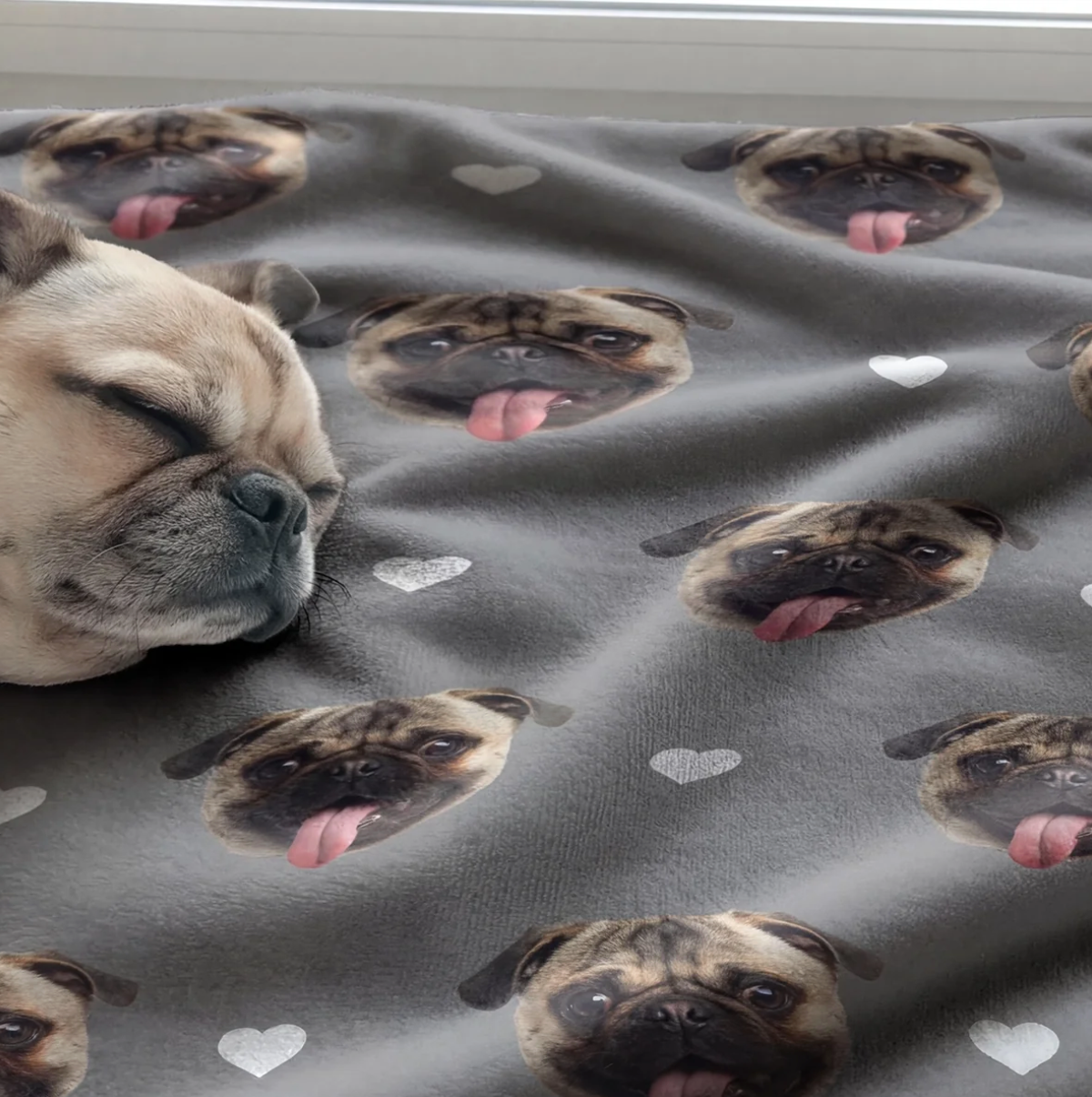 Grey printed blanket with pug pet heads and heart motifs, ideal for pets.
