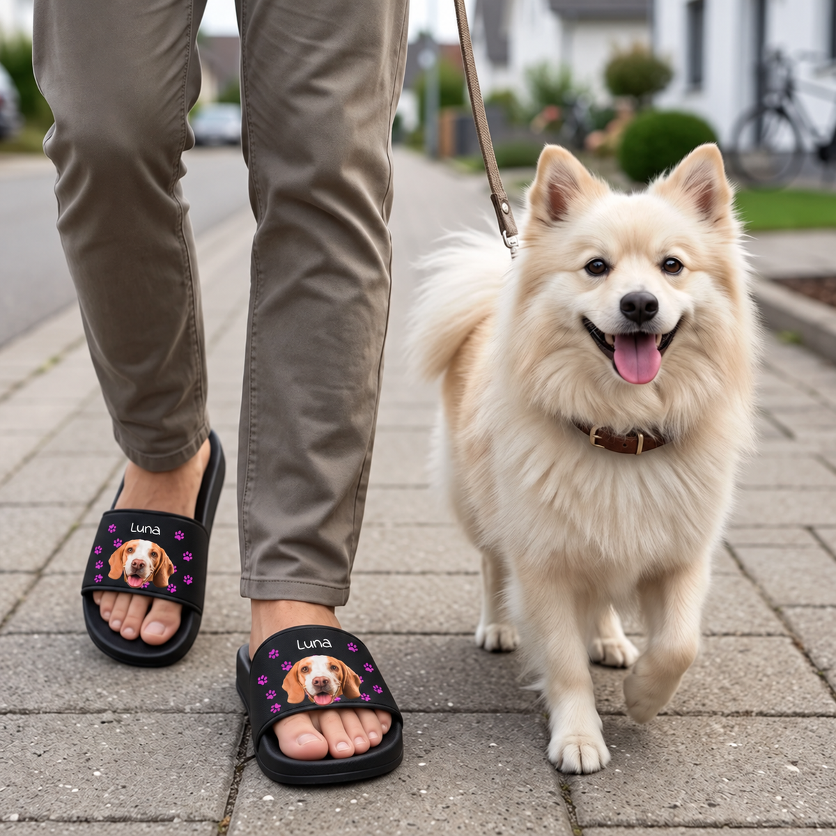 Personalized black slides with dog picture and floral motifs. The wearer is walking a dog.