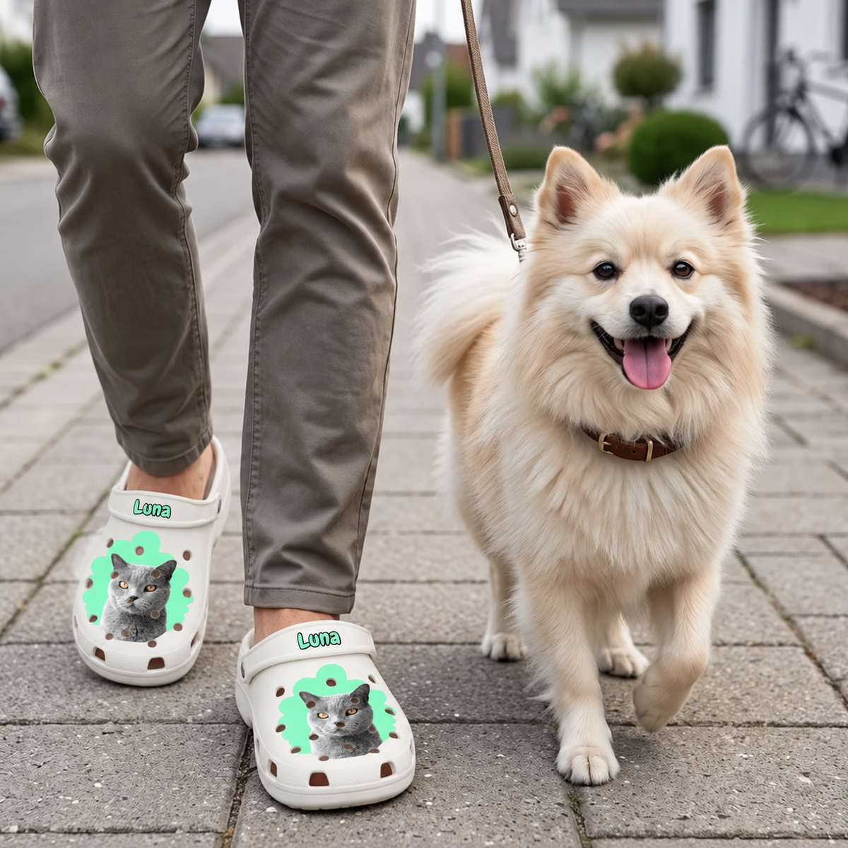 Personalized light beige clogs with cat portrait, worn by a person with a dog on the street.