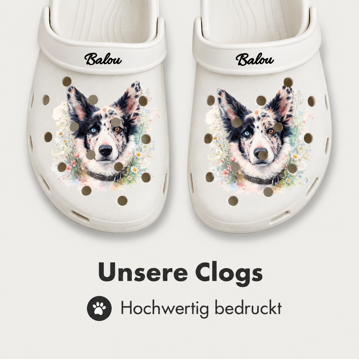 Personalized white clogs with a watercolor dog print and the name Balou. High-quality finish.